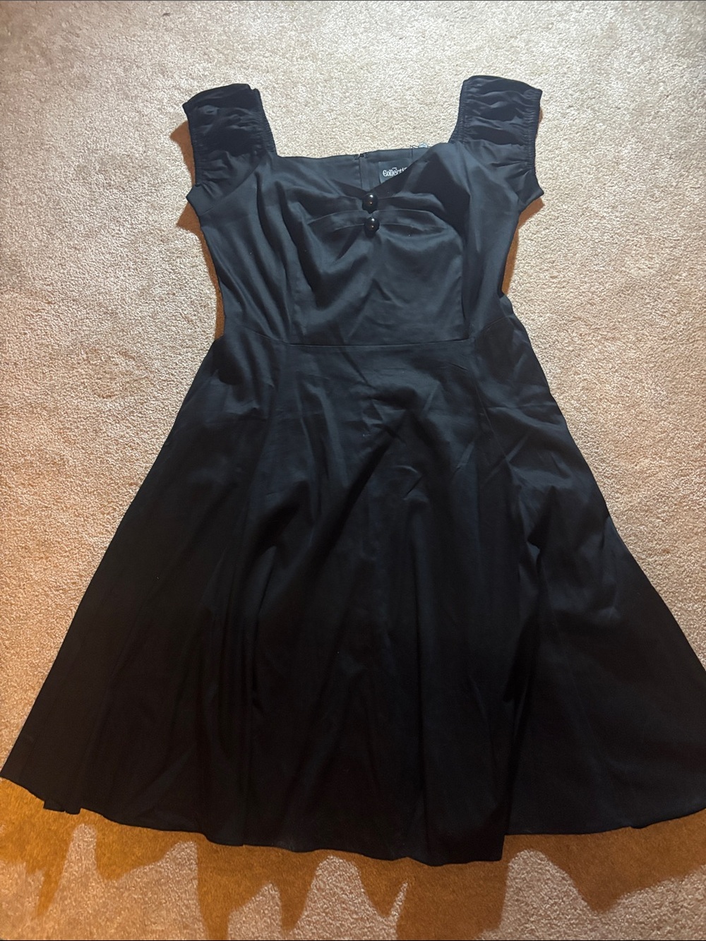 Black dress with button details